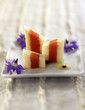 Squares of kakis and almond milk jelly