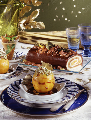 Photo: Caramelized peach with crushed pistachios and hazelnuts,chocolate and peach log cake Caramelized peach with crushed pistachios and hazelnuts,chocolate and peach log cake