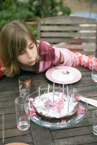 Photo: Blowing out the candles on the birthday cake Blowing out the candles on the birthday cake