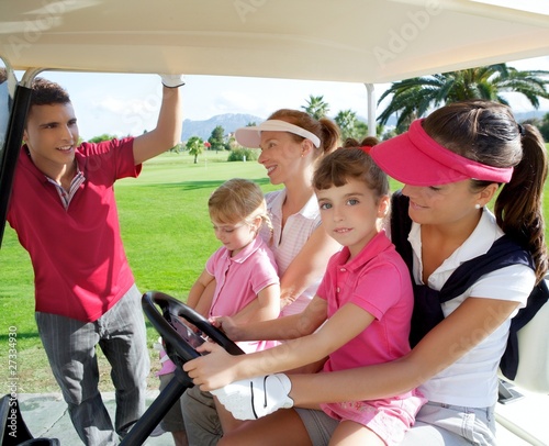 Photo: golf course mothers and daughters in buggy golf course mothers and daughters in buggy