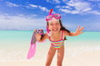 Snorkeling girl on beach