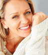 An attractive Caucasian woman giving you warm smile An attractive Caucasian woman giving you warm smile