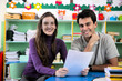 Teacher and parent in classroom