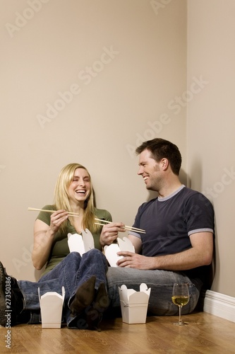 Photo: Couple Eating On The Floor Couple Eating On The Floor