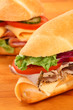 A large ham and tomato ssandwiches A large ham and tomato ssandwiches