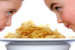 Children with Bowl of Crisps.Models Released