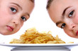 Children with Bowl of Crisps.Models Released