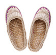 Old Russian sandals made of bark on the white Old Russian sandals made of bark on the white