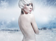 Beauty blonde in the winter scenery
