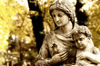 Monument of the woman with the child on a cemetery Monument of the woman with the child on a cemetery