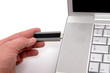 Men connecting flash drive