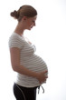 Image of pregnant woman touching her belly with hands Image of pregnant woman touching her belly with hands