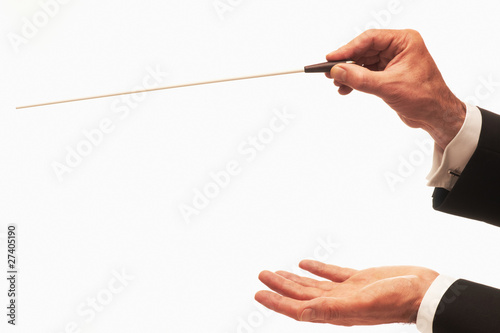 Foto: Conductor conducting an orchestra Conductor conducting an orchestra