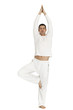 Photo: man dressed in white practicing yoga man dressed in white practicing yoga