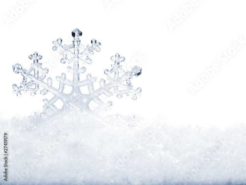 Photo: Snowflake in snow. Snowflake in snow.