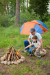 Father and the son at a fire