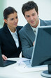Two business colleagues working together