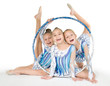 Little beautiful gymnasts with the hoop