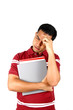 Young Indian student holding his head in stress.