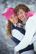 couple playing with snow