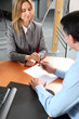People in the office signing contract People in the office signing contract