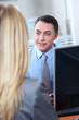Woman meeting financial adviser in office Woman meeting financial adviser in office