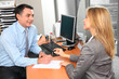 People in the office signing contract