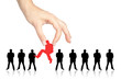 Female hand picking a chosen person from a group