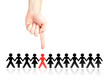 Finger selecting and showing a man from a crowd