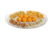 Different types of Indian sweets and snacks kept in a plate