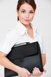 assured businesswoman with black briefcase assured businesswoman with black briefcase