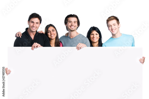 Foto: Happy people holding sign Happy people holding sign