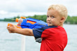 Boy Firing Water Gun