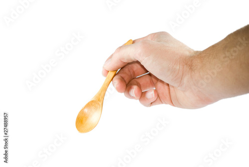 Photo: mano con cucchiao mano con cucchiao