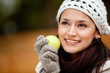 Pensive autumn woman