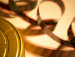 The movie. Filmstrip coming out of his can