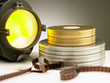 Filmstrip, cans and fresnel light. Horizontal version.