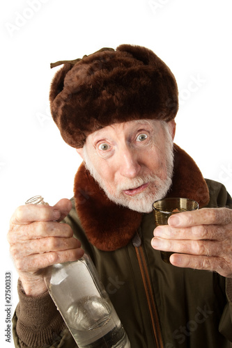 Foto: Russian Man in Fur Cap with Vodka Russian Man in Fur Cap with Vodka
