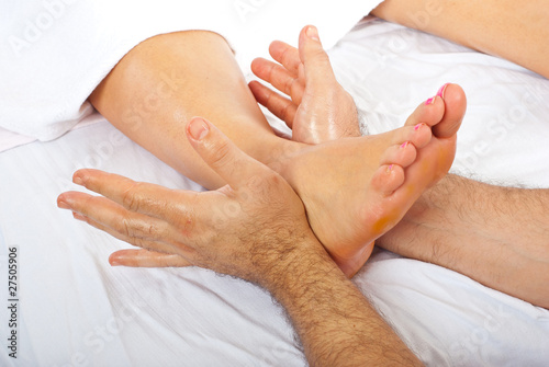 Photo: Detail of massage of foot Detail of massage of foot