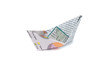 Close up origami newspaper ship isolated on white background