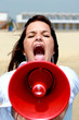 Young Woman Using Megaphone. Model Released