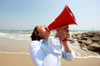 Young Woman Using Megaphone. Model Released