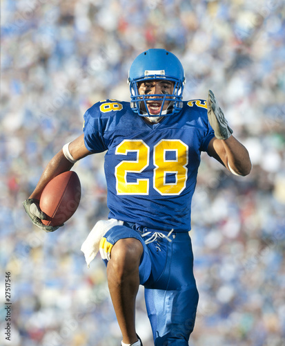 Photo: Football player in game action Football player in game action