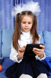 schoolgirl with calculator in sofa schoolgirl with calculator in sofa