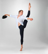 Male ballet dancer performing a step with hat in hand Male ballet dancer performing a step with hat in hand
