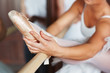 Ballerina's foot dancing at ballet bar