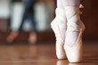 Dancer in ballet shoes dancing in Pointe Dancer in ballet shoes dancing in Pointe
