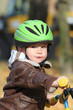 Photo: Child learning to ride on his first bike Child learning to ride on his first bike