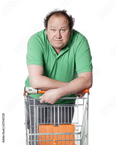 Photo: homme indécis au supermarché courses homme indécis au supermarché courses