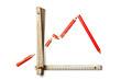 falling graph with worn out pencils and rule